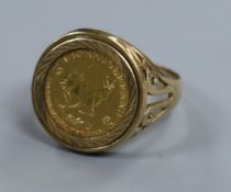 A 1896 1/10 gold krugerrand in 9ct gold ring setting, size S.