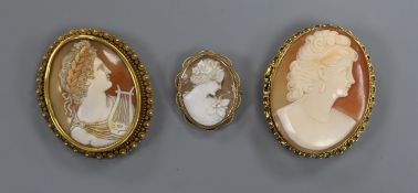 Two 9ct gold mounted oval cameo brooches and one other cameo brooch.