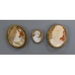 Two 9ct gold mounted oval cameo brooches and one other cameo brooch.