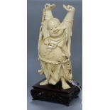 A large Chinese carved ivory standing figure of Budai Republic period 30cm excluding wood stand