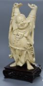 A large Chinese carved ivory standing figure of Budai Republic period 30cm excluding wood stand