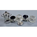 A pair of George V silver salts with liners, a pair of silver mounted glass salts, a silver pill