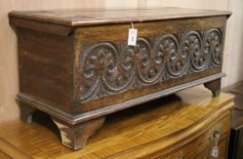 An 18th century style carved oak coffer W.120cm