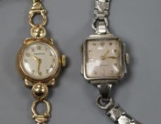 A Rolex lady's stainless steel wristwatch and a 9ct gold lady's wristwatch