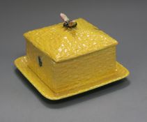 A Carltonware lustreware honey pot and cover, with bee finial