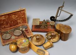 A collection of Mauchline ware, weights, scales, etc.