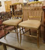 A pair of giltwood salon chairs