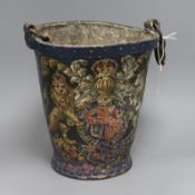 An early 19th century leather fire bucket, painted with the Royal Coat of Arms