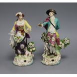 A pair of Derby style figures tallest 21cm