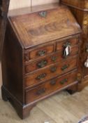 A George III design mahogany bureau of small proportions W.64cm