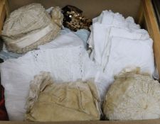 A group of 19th century christening gowns , bonnets etc