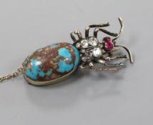A Victorian yellow metal, turquoise, diamond and ruby set bug brooch, with missing leg and one stone