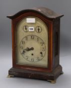 A German mahogany three train mantel clock