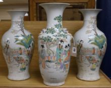 A pair of vases and one other Tallest 42cm