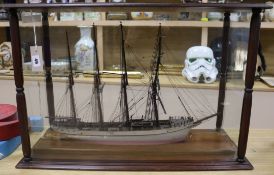 A model ship, in a glass and mahogany case, c.1900 length 73cm