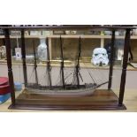 A model ship, in a glass and mahogany case, c.1900 length 73cm