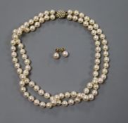 A double-row uniform pearl necklace, 9ct gold and seed pearl clasp and a pair of pearl stud