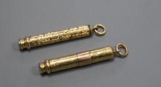 An early 20th century Sampson Mordan engraved yellow metal cased propelling pencil and one other