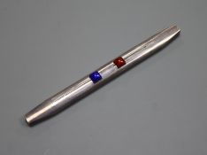 A white metal and enamel mounted double ended propelling pen/pencil, 17.8cm.