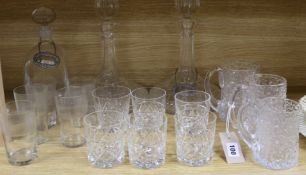 A quantity of glassware, including three Whitefriars style glasses, three decanters and two silver