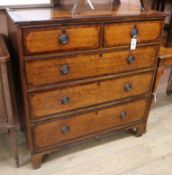 A late George IV oak and mahogany crossbanded chest of drawers W.99cm