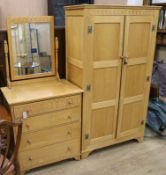 A panelled light oak two door wardrobe and matching dressing chest (2)