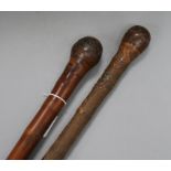 Two late 19th century carved Japanese bamboo walking canes