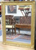 A large Victorian style gilt framed wall mirror