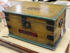 A wooden chest containing a plate tin train and accessories