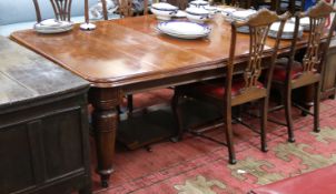 A Victorian mahogany extending dining table