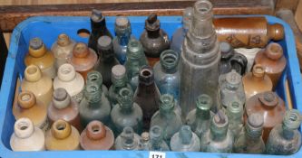 A quantity of ceramic and glass bottles