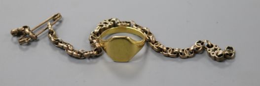 A small yellow gold signet ring (tests as 18ct) and a yellow metal bracelet (a.f)