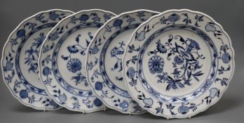 Three Meissen blue and white dishes and another by another factory