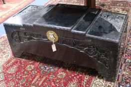 A Chinese ebonised camphorwood chest W.120cm