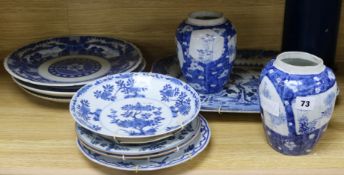 A collection of Chinese and Japanese blue and white vases, plates and dishes