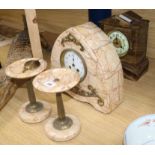 An Art Deco rouge marble clock garniture and similar clock