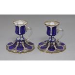 A pair of 19th century Bohemian blue flash cut chambersticks height 10cm