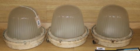 Three domed glass industrial lights