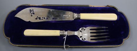 A cased pair of Edwardian silver fish servers by William Hutton & Sons, London, 1905.