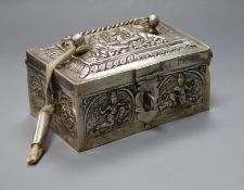 An Indian white metal rectangular box with hinged cover, 11.6cm.