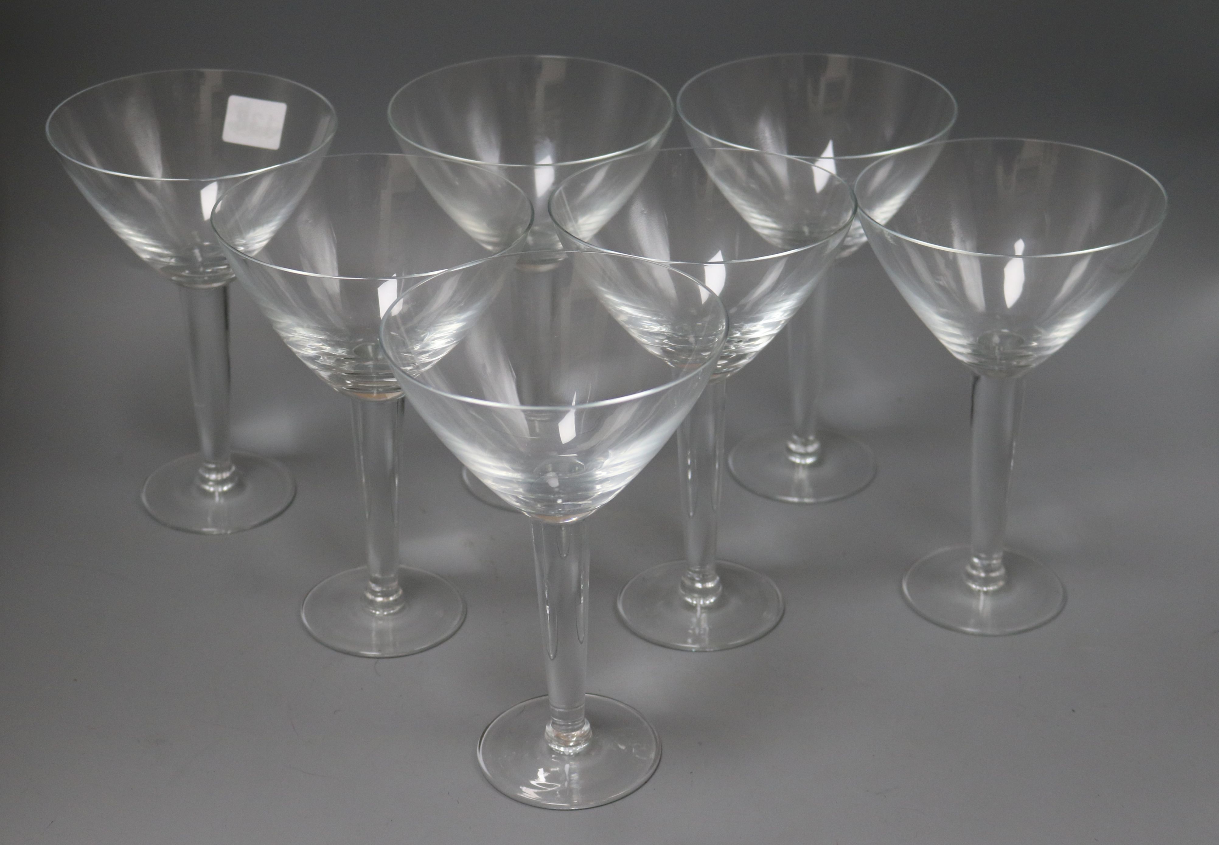 A set of six champagne saucers, with conical bowls