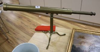 A Victorian brass telescope and stand