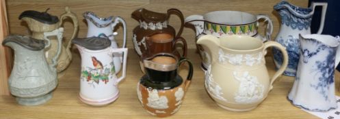 A quantity of assorted Victorian and other ceramic jugs including Doulton