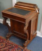 A late Victorian walnut davenport W.56cm