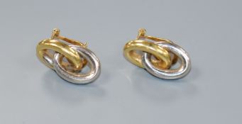 A modern pair of 18ct two colour gold double loop earrings, 20mm.