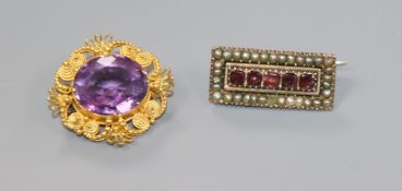 A Victorian yellow metal and amethyst cannetile work brooch and a Victorian garnet and split pearl