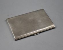 A 1960's engine turned silver cigarette case, 12.5cm, gross 5 oz.