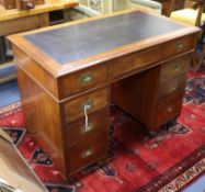 A 19th century mahogany military pedestal desk fitted seven drawers W.102cm