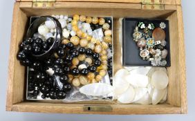 A box containing: micro mosaic earrings and bracelet, various intaglios, mother-of-pearl counters