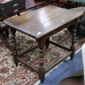 An early 18th century oak side table, with later carved frieze W.88cm